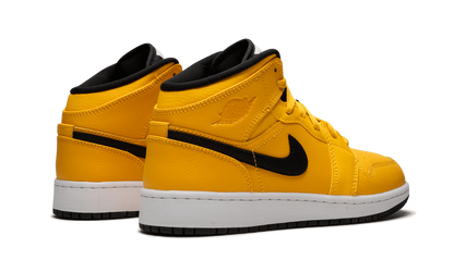 Air Jordan 1 Mid GS "University Gold" 554725 700