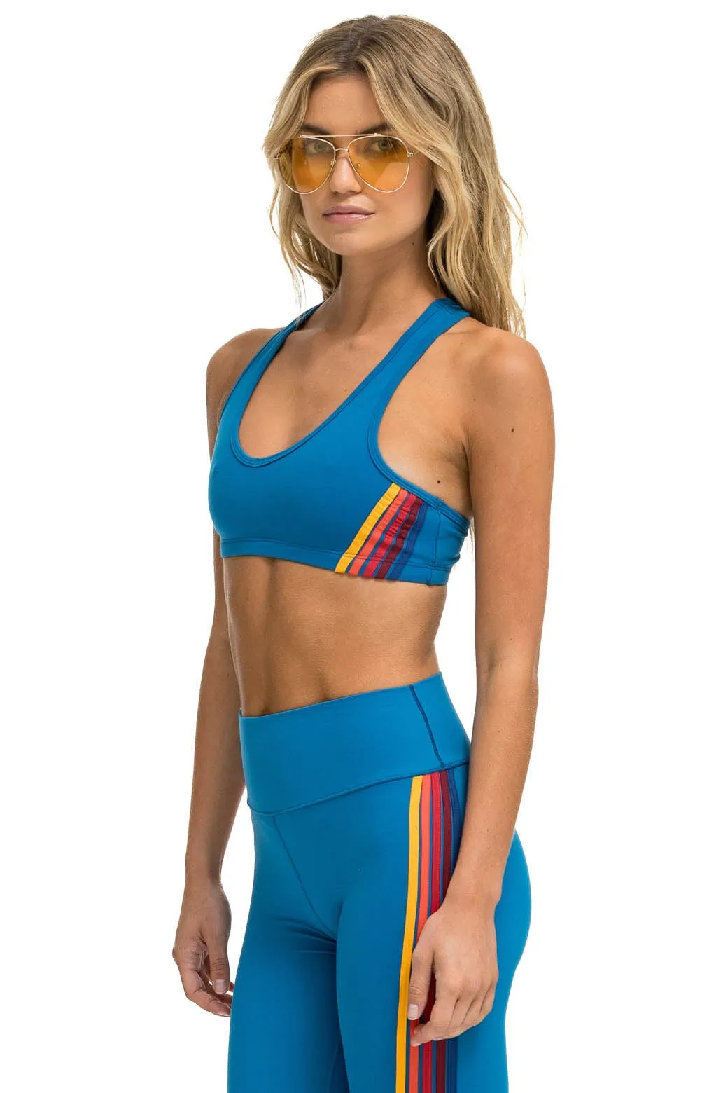 WOMEN'S 5 STRIPE V-CUT SPORTS BRA - CARRIBEAN