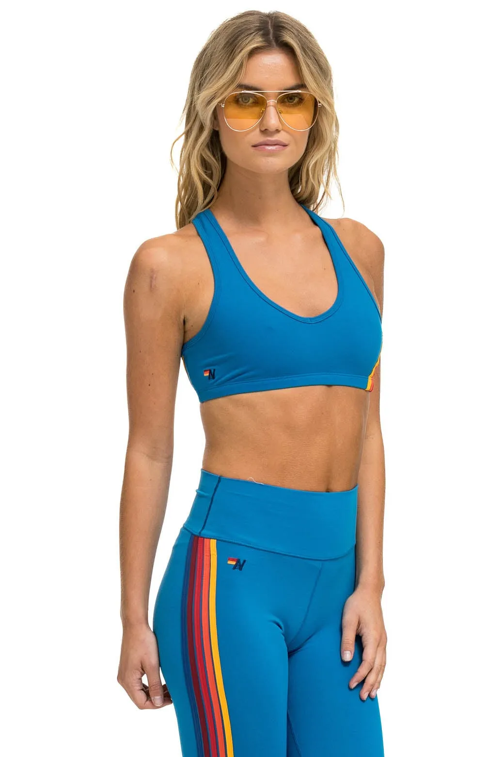 WOMEN'S 5 STRIPE V-CUT SPORTS BRA - CARRIBEAN