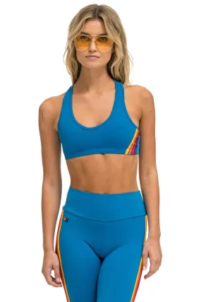 WOMEN'S 5 STRIPE V-CUT SPORTS BRA - CARRIBEAN