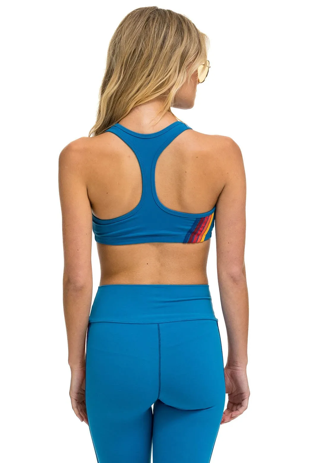 WOMEN'S 5 STRIPE V-CUT SPORTS BRA - CARRIBEAN